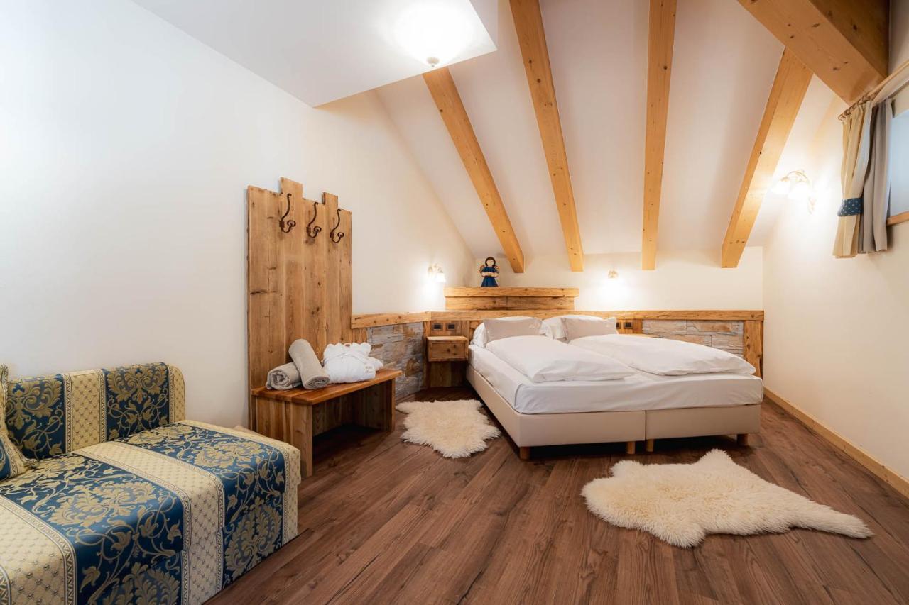 Renè Dolomites Boutique Hotel Pozza di Fassa Esterno foto