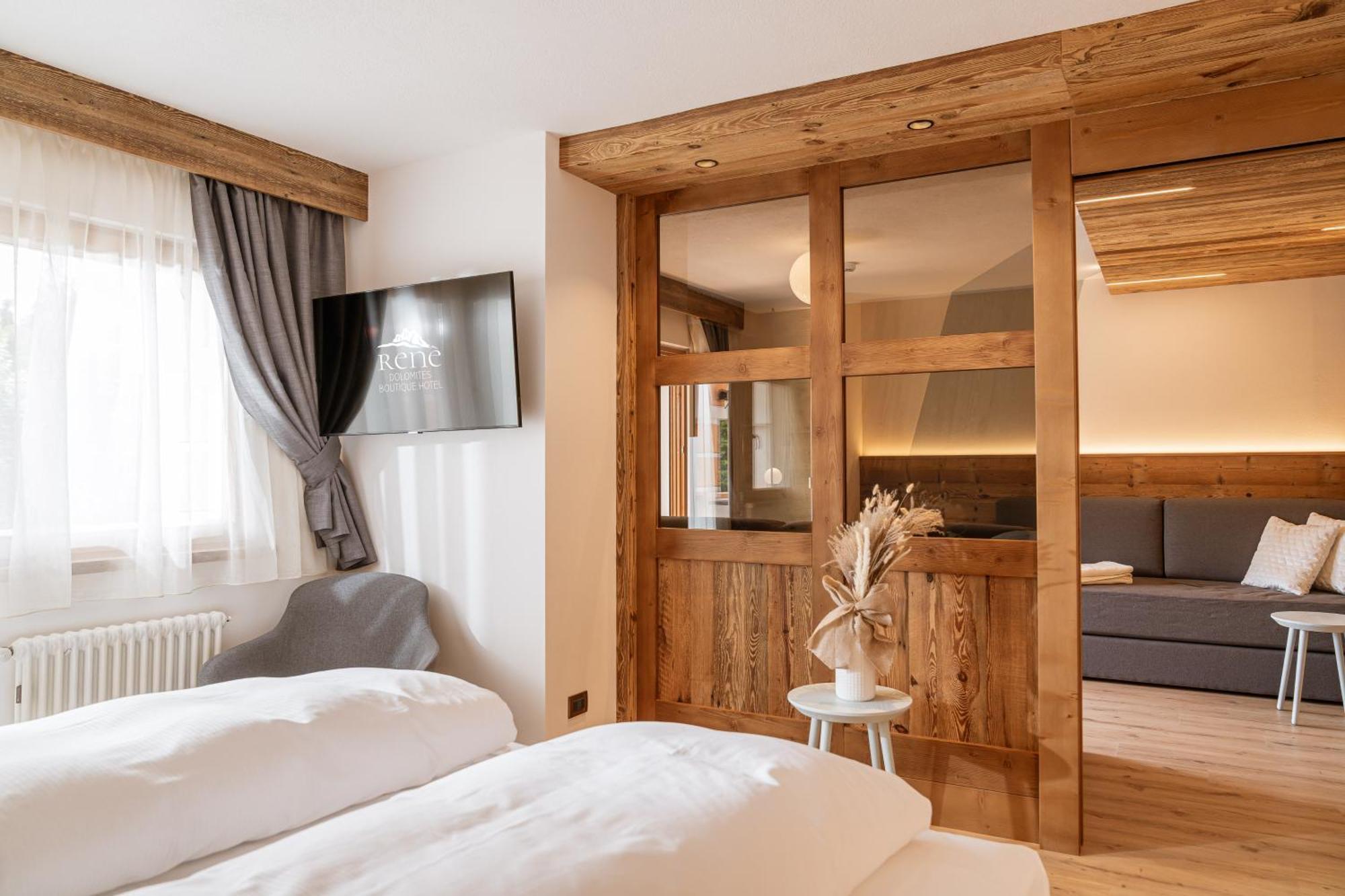 Renè Dolomites Boutique Hotel Pozza di Fassa Esterno foto