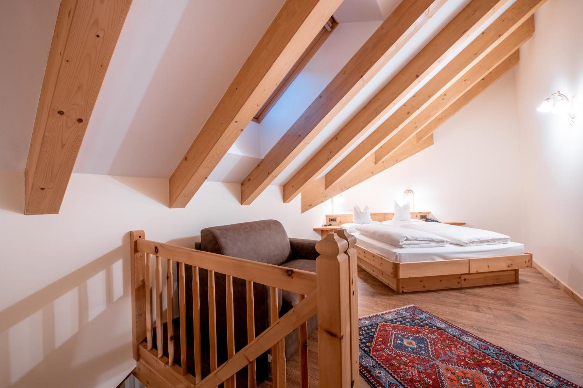 Renè Dolomites Boutique Hotel Pozza di Fassa Camera foto