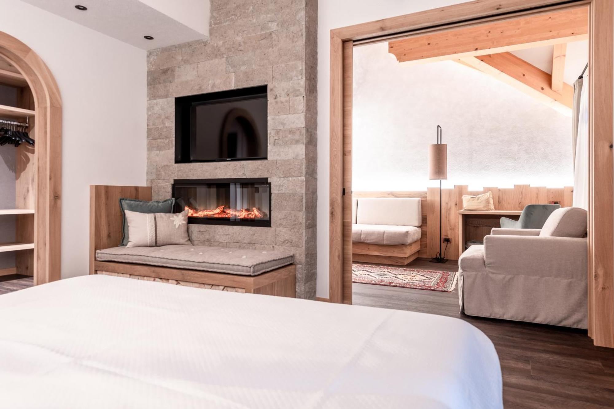 Renè Dolomites Boutique Hotel Pozza di Fassa Esterno foto